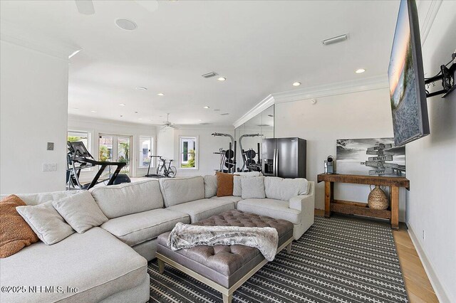 24736 Harbour View Dr, Ponte Vedra Beach, FL 32082 - living room with crown molding, light wood-style flooring, recessed lighting, and a ceiling fan