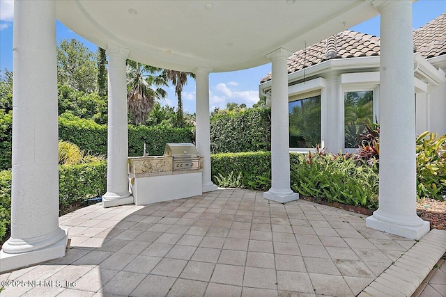 24736 Harbour View Dr, Ponte Vedra Beach, FL 32082 - view of patio / terrace with an outdoor kitchen