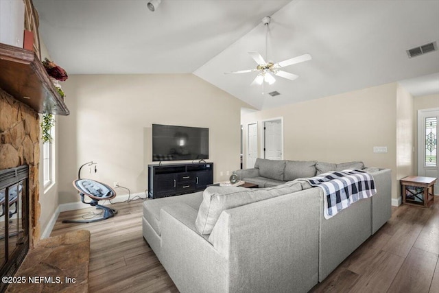 2168 Minorcan St, Middleburg, FL 32068 - living area featuring wood finished floors, a ceiling fan, and vaulted ceiling