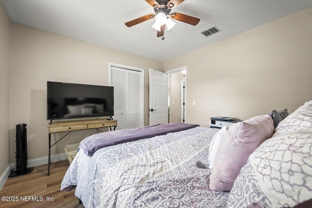 2168 Minorcan St, Middleburg, FL 32068 - bedroom featuring wood finished floors, a closet, and ceiling fan