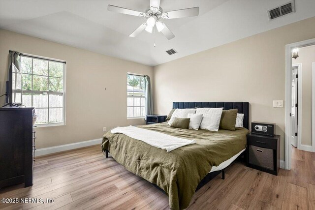 2168 Minorcan St, Middleburg, FL 32068 - bedroom with wood finished floors and ceiling fan