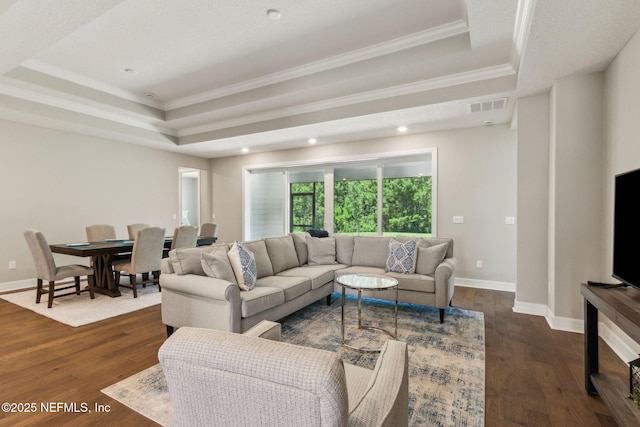 613 Witty Banter Ct, Yulee, FL 32097 - living area with a tray ceiling, ornamental molding, dark wood-style flooring, and recessed lighting