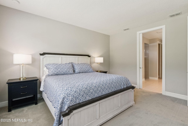 613 Witty Banter Ct, Yulee, FL 32097 - bedroom featuring light colored carpet and baseboards