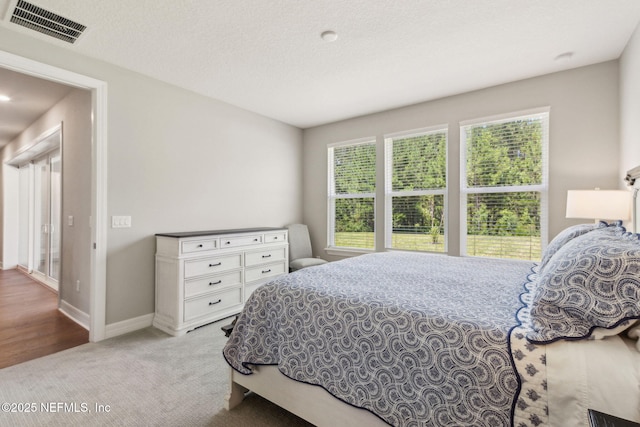 613 Witty Banter Ct, Yulee, FL 32097 - bedroom featuring carpet and baseboards