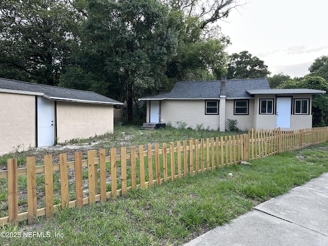 9846 Highland Ave, Jacksonville, FL 32208 - view of side of property with stucco siding
