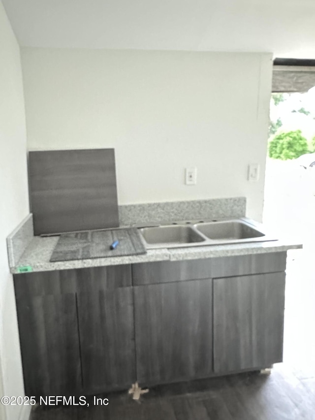 9846 Highland Ave, Jacksonville, FL 32208 - kitchen featuring light countertops and dark wood finished floors
