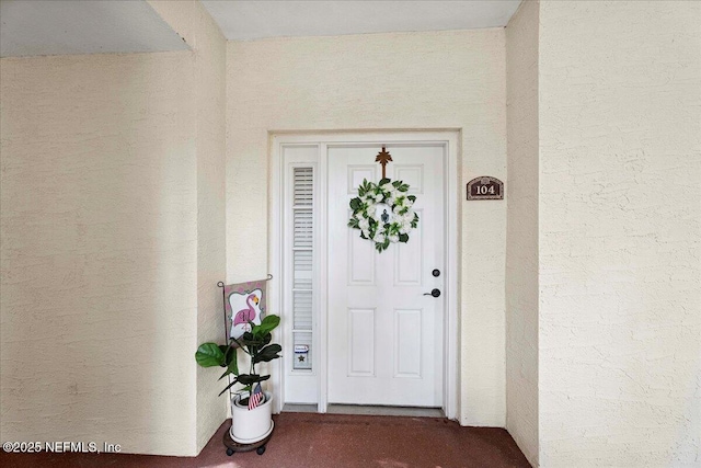 201 S Ocean Grande Dr Unit 104, Ponte Vedra Beach, FL 32082 - view of exterior entry with stucco siding