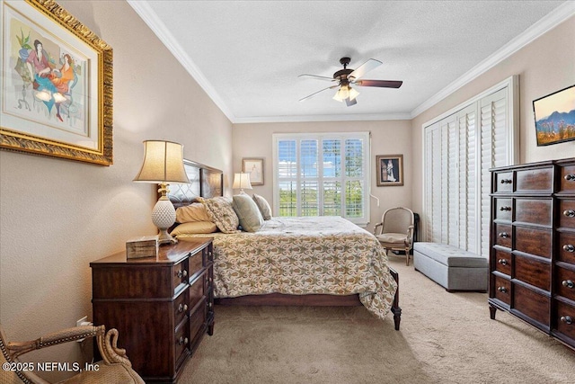 201 S Ocean Grande Dr Unit 104, Ponte Vedra Beach, FL 32082 - carpeted bedroom with ornamental molding, a ceiling fan, and a textured ceiling