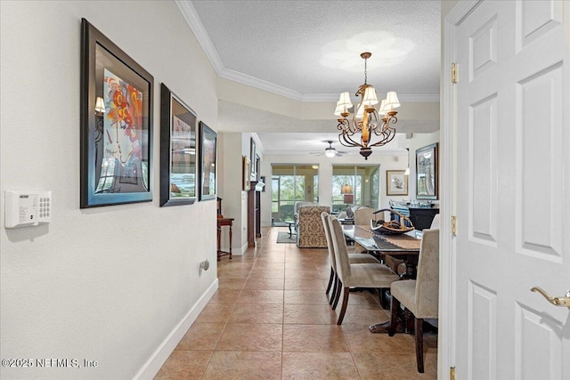 201 S Ocean Grande Dr Unit 104, Ponte Vedra Beach, FL 32082 - dining area featuring a chandelier, ornamental molding, a textured ceiling, and light tile patterned floors