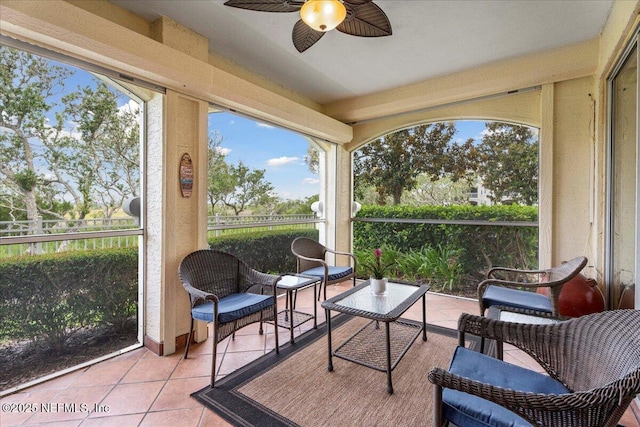 201 S Ocean Grande Dr Unit 104, Ponte Vedra Beach, FL 32082 - sunroom featuring ceiling fan