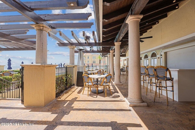201 S Ocean Grande Dr Unit 104, Ponte Vedra Beach, FL 32082 - view of patio / terrace with a pergola and outdoor dining area