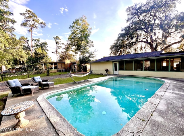457 Nightingale Rd, Jacksonville, FL 32216 - swimming pool with a patio