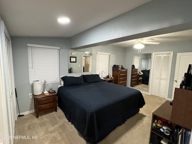 457 Nightingale Rd, Jacksonville, FL 32216 - bedroom featuring light carpet, two closets, and a ceiling fan