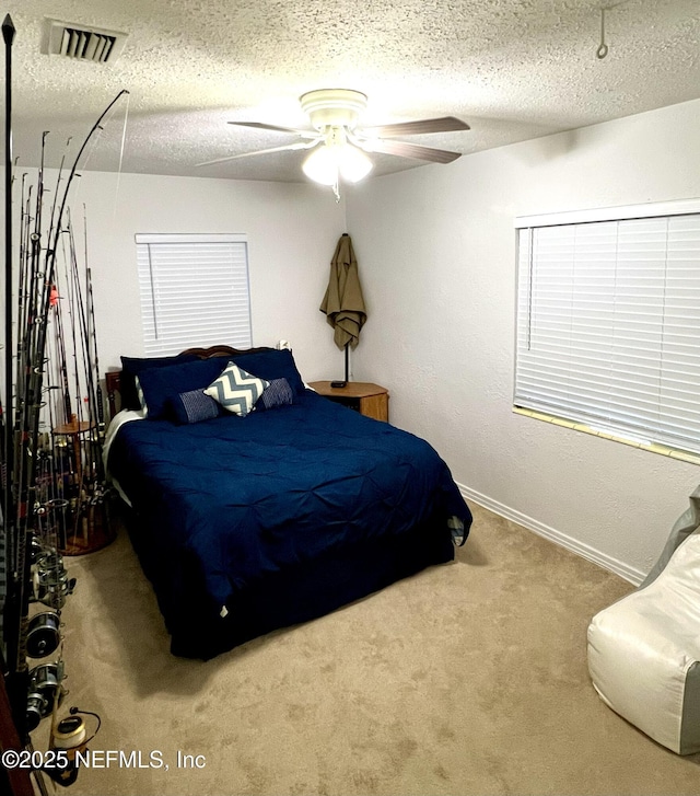457 Nightingale Rd, Jacksonville, FL 32216 - bedroom with carpet, a textured ceiling, and ceiling fan