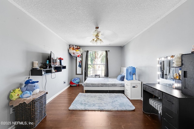 2875 Majestic Oaks Ln, Green Cove Springs, FL 32043 - bedroom with dark wood-style flooring and a textured ceiling