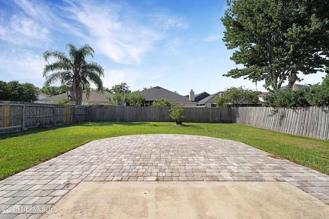 2875 Majestic Oaks Ln, Green Cove Springs, FL 32043 - fenced backyard with a patio area