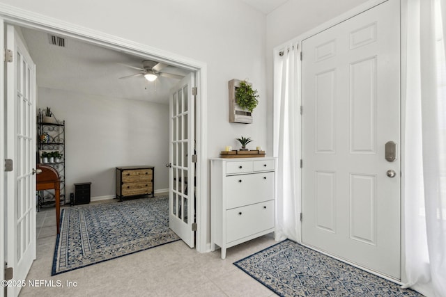 86180 Tranquil Ct, Yulee, FL 32097 - foyer entrance featuring french doors and ceiling fan
