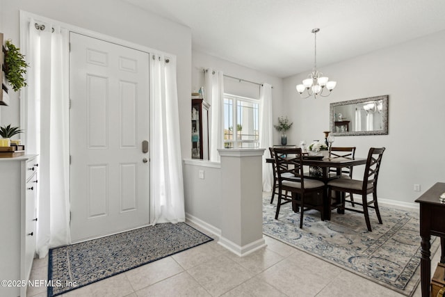 86180 Tranquil Ct, Yulee, FL 32097 - foyer featuring a chandelier and light tile patterned floors