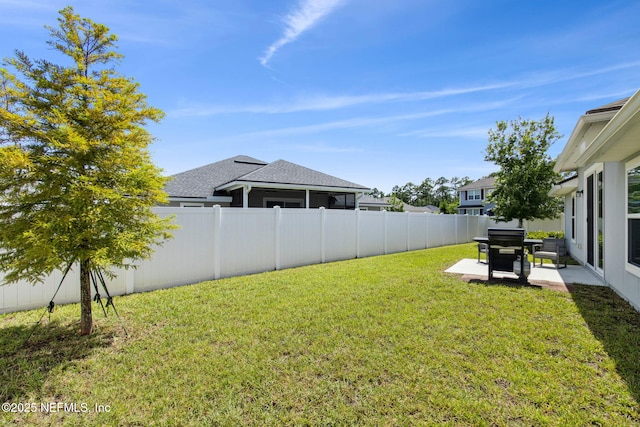 86180 Tranquil Ct, Yulee, FL 32097 - fenced backyard with a patio area