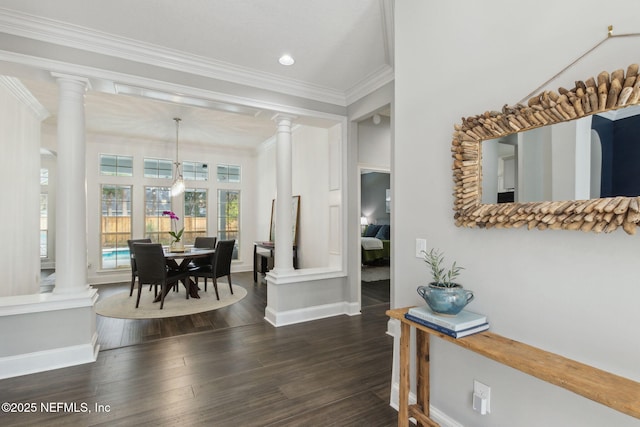 2205 Ashley Ct, Fernandina Beach, FL 32034 - foyer featuring ornate columns, ornamental molding, dark wood-type flooring, and recessed lighting