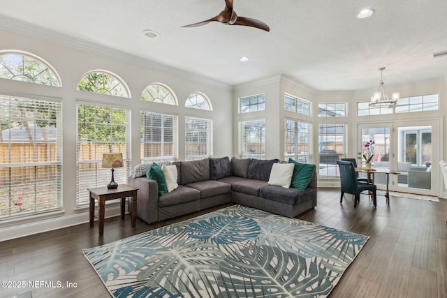 2205 Ashley Ct, Fernandina Beach, FL 32034 - living room featuring a ceiling fan, ornamental molding, recessed lighting, a chandelier, and dark wood-style floors