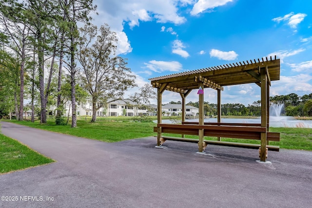 2205 Ashley Ct, Fernandina Beach, FL 32034 - view of property's community featuring a lawn, a water view, and a pergola
