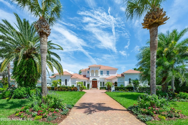 23 Corona Rd, Ponte Vedra Beach, FL 32082 - mediterranean / spanish-style house featuring a front yard and stucco siding