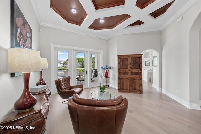 23 Corona Rd, Ponte Vedra Beach, FL 32082 - living area with arched walkways, coffered ceiling, ornamental molding, light wood-type flooring, and beam ceiling