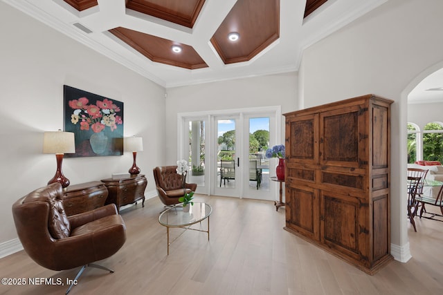 23 Corona Rd, Ponte Vedra Beach, FL 32082 - living area featuring arched walkways, crown molding, coffered ceiling, light wood finished floors, and beamed ceiling