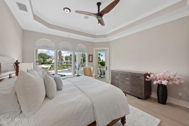 23 Corona Rd, Ponte Vedra Beach, FL 32082 - bedroom with a raised ceiling, light wood-type flooring, access to outside, ceiling fan, and ornamental molding