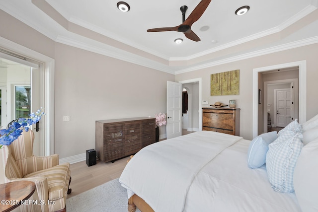 23 Corona Rd, Ponte Vedra Beach, FL 32082 - bedroom featuring light wood-style flooring, crown molding, a ceiling fan, and arched walkways