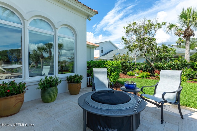 23 Corona Rd, Ponte Vedra Beach, FL 32082 - view of patio featuring a fire pit
