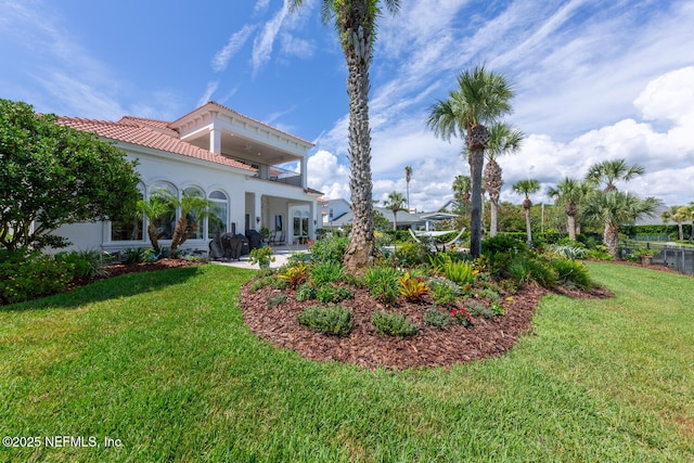 23 Corona Rd, Ponte Vedra Beach, FL 32082 - view of grassy yard featuring a balcony and a patio area