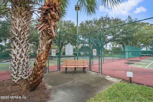7 Arbor Club Dr Unit 214, Ponte Vedra Beach, FL 32082 - view of tennis court featuring a gate