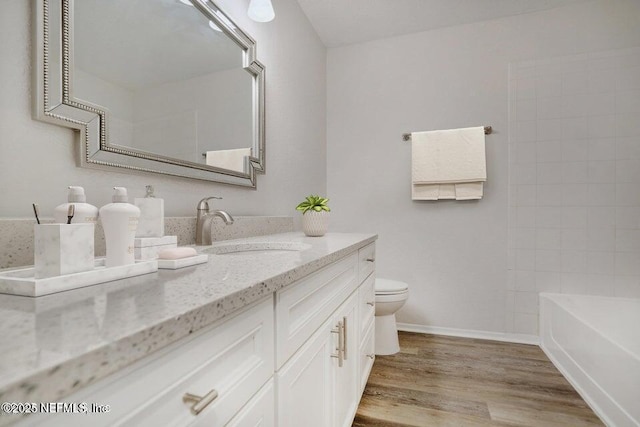 7 Arbor Club Dr Unit 214, Ponte Vedra Beach, FL 32082 - bathroom featuring vanity and wood finished floors