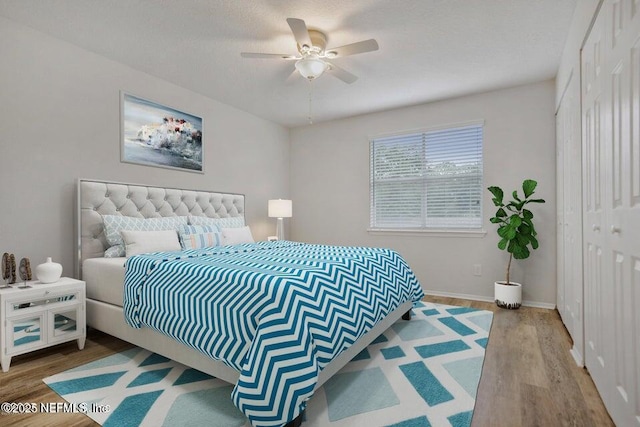 7 Arbor Club Dr Unit 214, Ponte Vedra Beach, FL 32082 - bedroom featuring a closet, wood finished floors, and ceiling fan