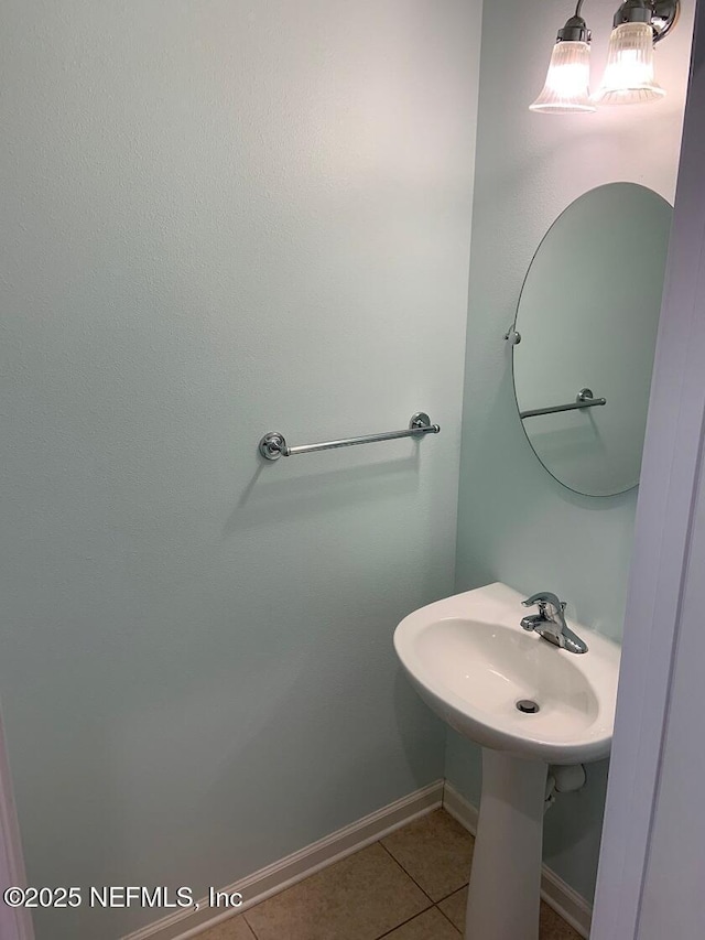 13312 Low Tide Way, Jacksonville, FL 32258 - bathroom with tile patterned floors and baseboards