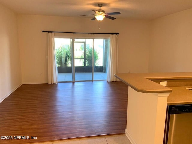 13312 Low Tide Way, Jacksonville, FL 32258 - unfurnished living room featuring light wood-style floors and ceiling fan