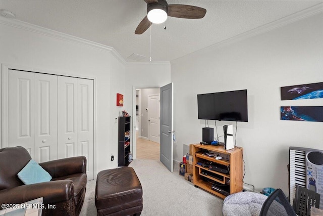 75013 Pondside Ln, Yulee, FL 32097 - living area with ornamental molding, ceiling fan, and carpet flooring