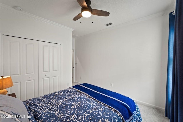 75013 Pondside Ln, Yulee, FL 32097 - carpeted bedroom with a closet, ornamental molding, and ceiling fan