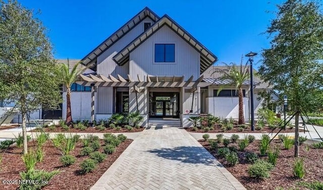 75013 Pondside Ln, Yulee, FL 32097 - modern farmhouse with a pergola