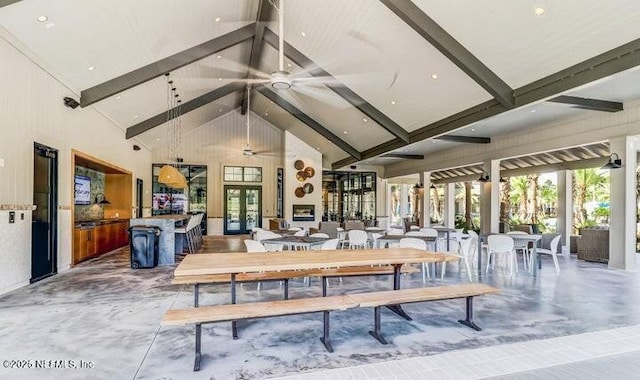 75013 Pondside Ln, Yulee, FL 32097 - view of patio / terrace featuring a ceiling fan and outdoor dining area