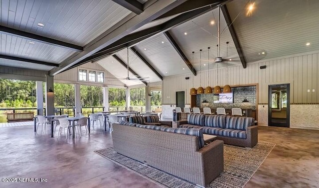 75013 Pondside Ln, Yulee, FL 32097 - living area featuring concrete floors, high vaulted ceiling, a ceiling fan, and beam ceiling