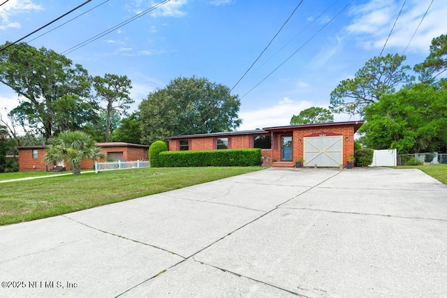 2510 Cesery Blvd, Jacksonville, FL 32211 - ranch-style home with concrete driveway and brick siding