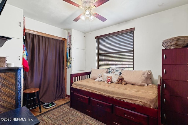 2510 Cesery Blvd, Jacksonville, FL 32211 - bedroom with wood finished floors and a ceiling fan