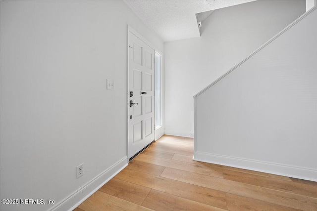 695 A1A Unit 146, Ponte Vedra Beach, FL 32082 - foyer entrance with light wood-type flooring and baseboards