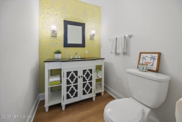 695 A1A Unit 146, Ponte Vedra Beach, FL 32082 - half bathroom featuring wood finished floors and vanity