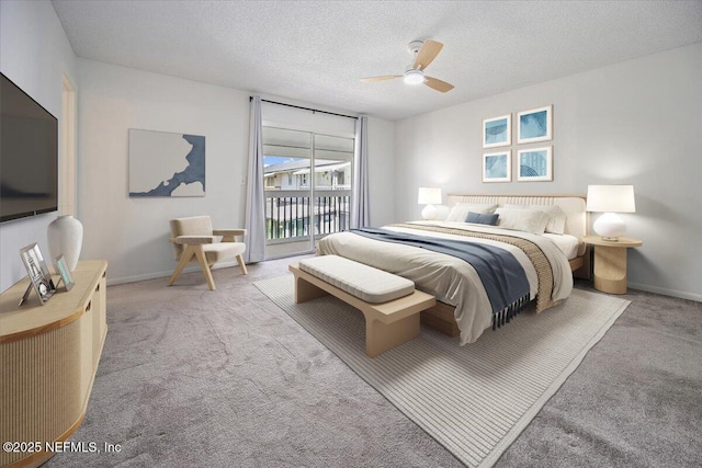 695 A1A Unit 146, Ponte Vedra Beach, FL 32082 - bedroom featuring access to outside, carpet, a textured ceiling, and ceiling fan