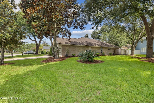 1208 Kyle Way S, Saint Johns, FL 32259 - view of property exterior with driveway, a shingled roof, an attached garage, and brick siding