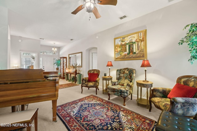 1208 Kyle Way S, Saint Johns, FL 32259 - living area featuring carpet flooring, ceiling fan, and arched walkways